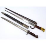 A late 19th century French Chassepot bayonet with metal scabbard,