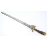 A 19th century short sword with wooden shaped grip,