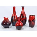 Five Royal Doulton flambé glazed vases to include three veined examples, the smallest height 11.