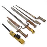 A group of six bayonets to include a saw backed example, a chassepot,