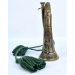 A bugle with cord and tassels for Rosshire Buffs, engraved names and dates (1920s and 30s) to body,