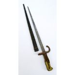 A late 19th century French Chassepot bayonet with scabbard, length 65.5cm.