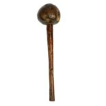 A 19th century Fijian Tava Tava with gnarled knob end and turned shaft, length 40cm.