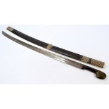 A 19th century European sword with horn handle,