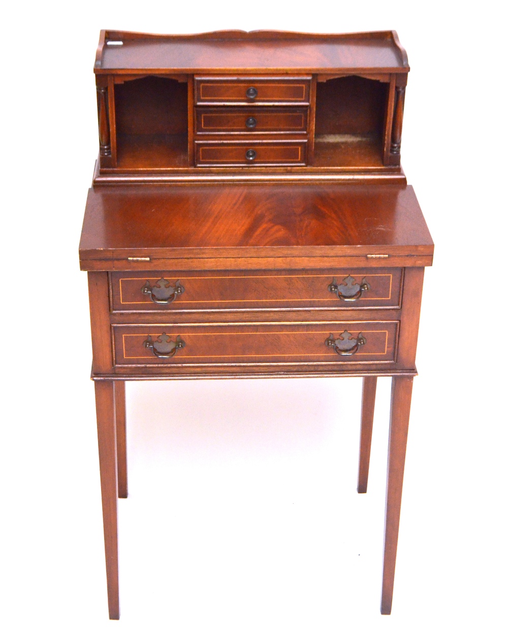 A 19th century mahogany and inlaid bonheur du jour, with foldover top above two long drawers,