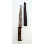 A WWI period bayonet with metal scabbard, length 47cm.