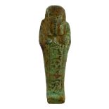 A small Egyptian turquoise faience shabti, with hieroglyph decoration to the front,