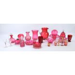 A quantity of cranberry glass including two mugs engraved 'For A Good Boy', and 'For A Good Girl',
