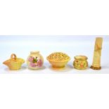 A group of Royal Worcester blush ivory including a trio of graduated baskets,