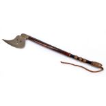 A wooden shafted axe with ribbed metal mounted grip, length 73cm.
