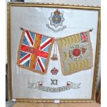 An embroidered silk panel commemorating the XI Devonshire Regiment, 66 x 60cm, framed.