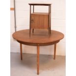 A mid-20th century circular oak dining table raised on four tapering supports, 72 x 115cm,