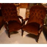 A pair of Victorian mahogany-framed armchairs on turned supports (2).