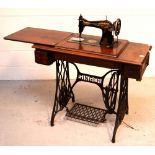 An early 20th century Singer sewing machine,