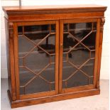 A late 19th/early 20th century oak astragal glazed bookcase, 115 x 119cm.