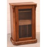 An Edwardian single-door glazed music cabinet,