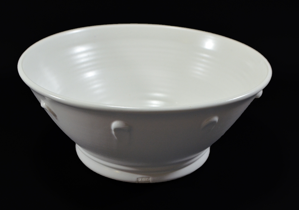 KEITH BRYMER JONES; a large white stoneware bowl with applied decoration, impressed mark,