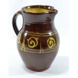 RAY FINCH (1914-2012) for Winchcombe Pottery; a slipware jug, galena glaze, impressed early WP mark,