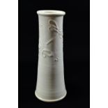ELAINE WELLS; a tapered white stoneware vase with applied decoration, incised mark, height 25.5cm.