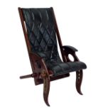 An unusual and good quality Italian made leather upholstered steamer chair, with hinged arms,