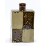DANIEL PRATAP; a rectangular stoneware bottle, checkerboard decoration, impressed mark, height 20cm.