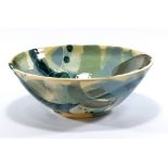 SALLY-JO BOND; a white earthenware bowl with brush decoration, impressed SJB mark, diameter 25.5cm.