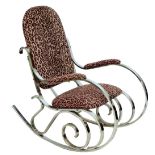 A contemporary chrome framed rocking chair with simulated leopard skin print to the padded back,