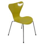 FRITZ HANSEN; a yellow 'Serious Seven' chair after design by Arne Jacobsen, on chromed legs.