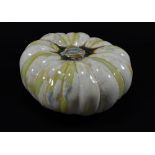KATE MALONE; a stoneware pumpkin, yellow and green crystalline glaze,