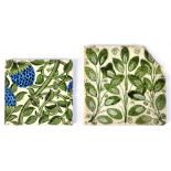 WILLIAM DE MORGAN; a square sectioned tile painted with green leaves,