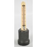 A late 19th century ivory mercury thermometer of plain tapering form,