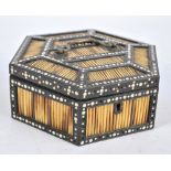 An early 20th century Anglo-Indian hexagonal lidded box decorated with porcupine quills and ivory