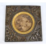 A late 19th/early 20th century Macclesfield School of Carving square section frame containing a