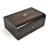 A Victorian rosewood writing slope with domed mother of pearl inlaid lid enclosing purple leather