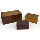 A late 19th century mahogany writing slope with inlaid lozenge decoration to the hinged lid and