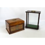 A Victorian walnut jewellery cabinet with hinged lid and glazed full front enclosing two drawers,