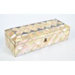 An early 20th century mother of pearl panelled glove box, 24 x 9.5 x 7.5cm (hinge af).