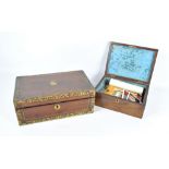A 19th century mahogany and crossbanded lidded box and a mahogany and brass detailed writing slope