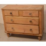 A 19th century pine two-over-three chest of drawers on squat baluster supports (af).