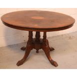 A Victorian oval inlaid walnut tilt-top loo table, raised on a quadripartite pedestal, height 67cm,