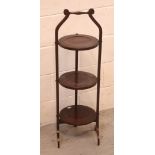 An Edwardian inlaid mahogany three-tier folding cake stand, height approx 87cm.