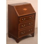 An Edwardian inlaid mahogany fall-front bureau of small proportions,