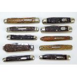 A group of various antler handled predominantly double bladed pen knives,