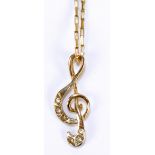 A 14ct yellow gold treble clef shaped pendant set with six paste stones, height 2.