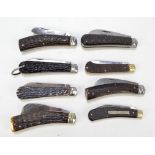 A collection of eight early 20th century antler and simulated antler single bladed pen knives