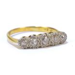 A yellow metal and five stone diamond illusion set ring, size Q, total approx 3.4g (marks rubbed).