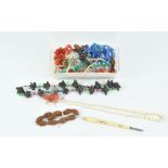 A quantity of costume jewellery including a Chinese blue glass necklace with sterling silver clasp,