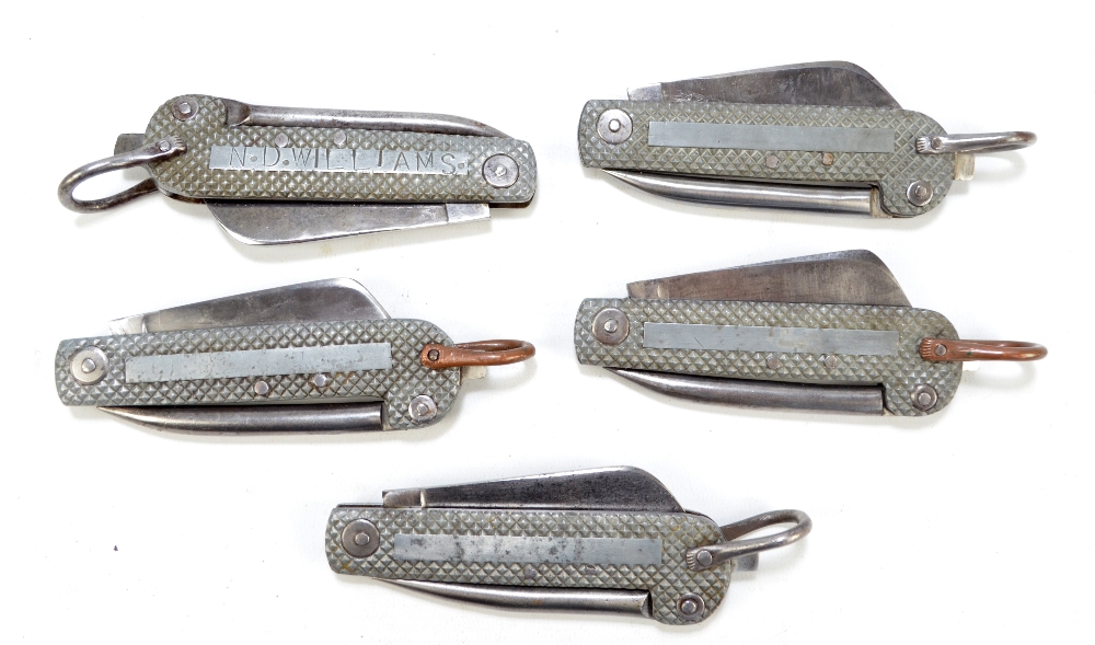 Five large checkered bodied clasp knives,