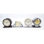 Two Smiths chrome cased Art Deco style timepieces, and two further bakelite Ferranti examples (4).