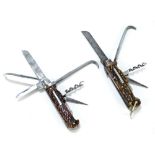 Two late 19th/early 20th century stag horn bodied steel bladed multi tool pocket knives,